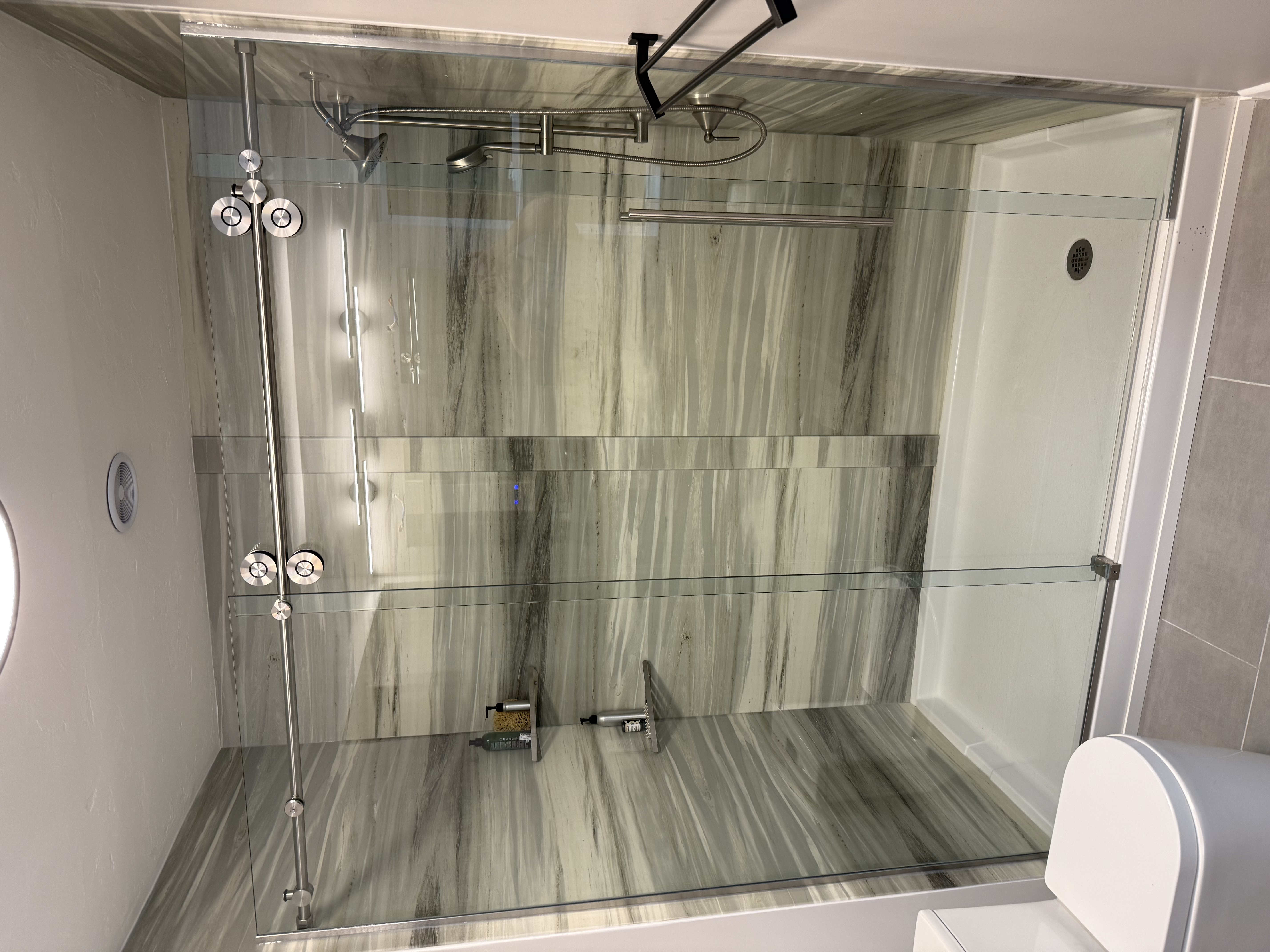 Frameless barn style heavy glass shower door